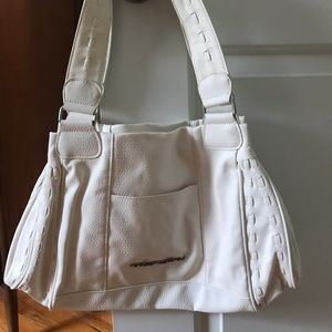 Crisp white volcom purse 🦋